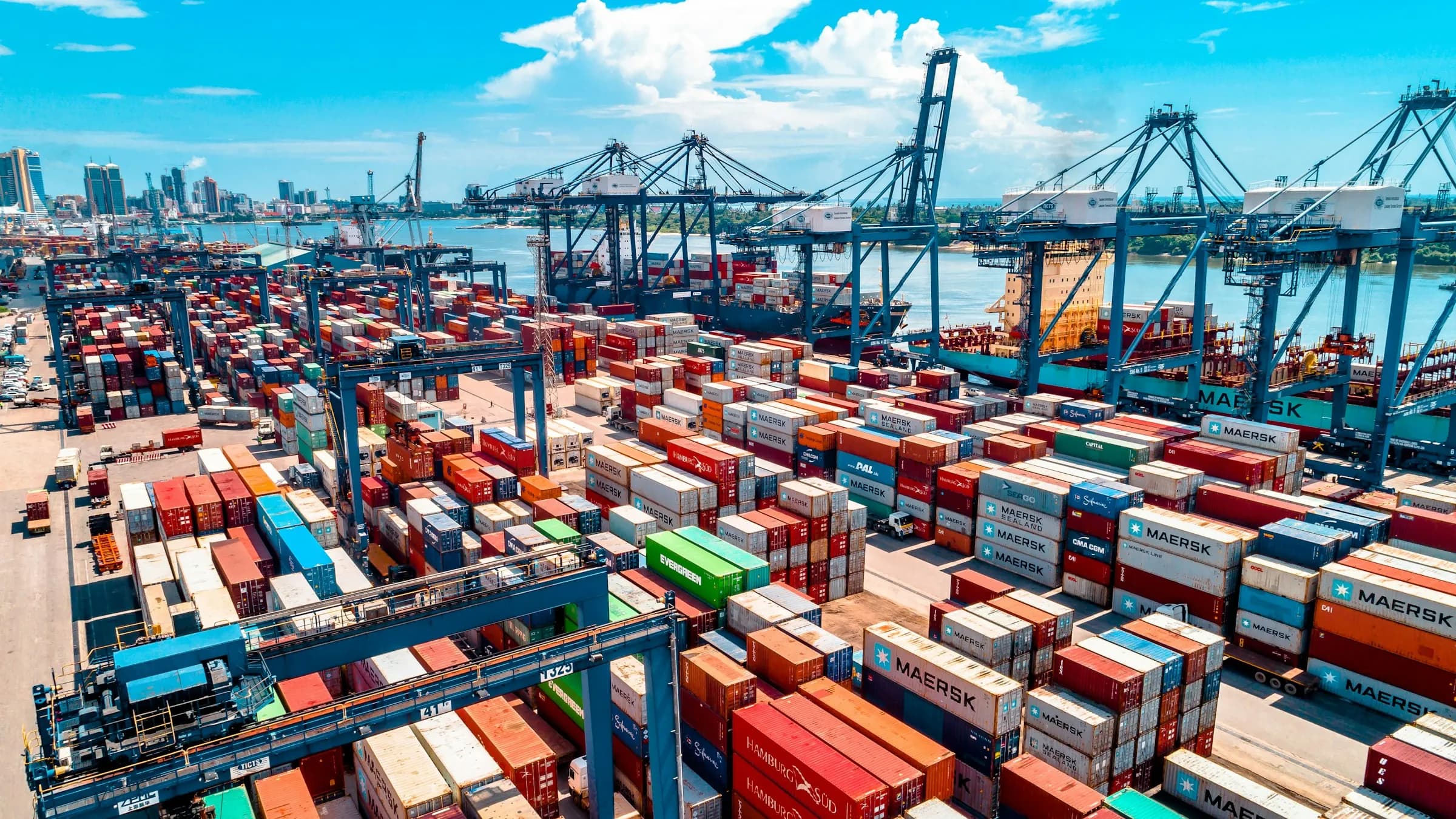 Stacked shipping containers at a sea port